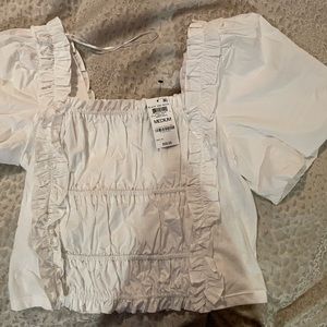 White crop top beautiful new top. Never worn. New with tags.